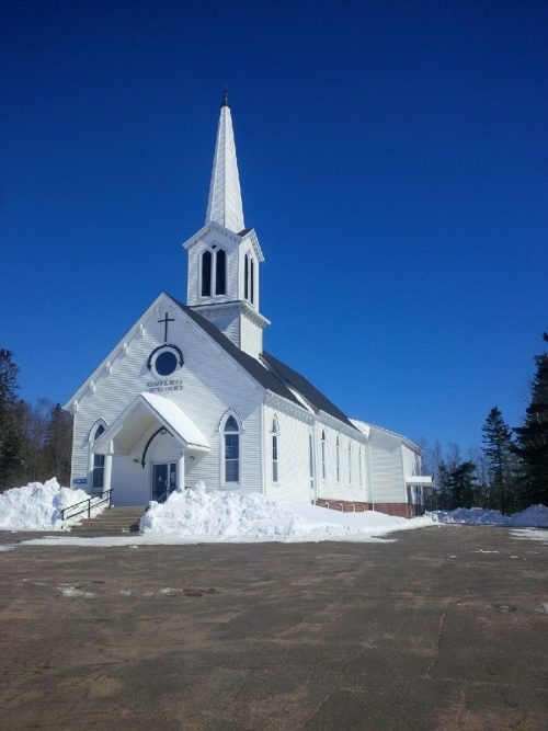 Keswick Ridge United Church during the winter thaw.